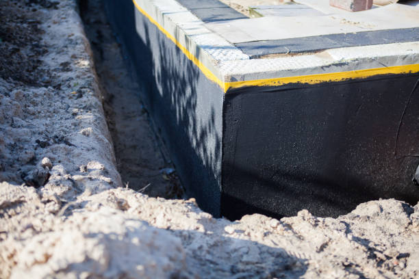 Professional Waterproofing technician working in Watervliet, NY